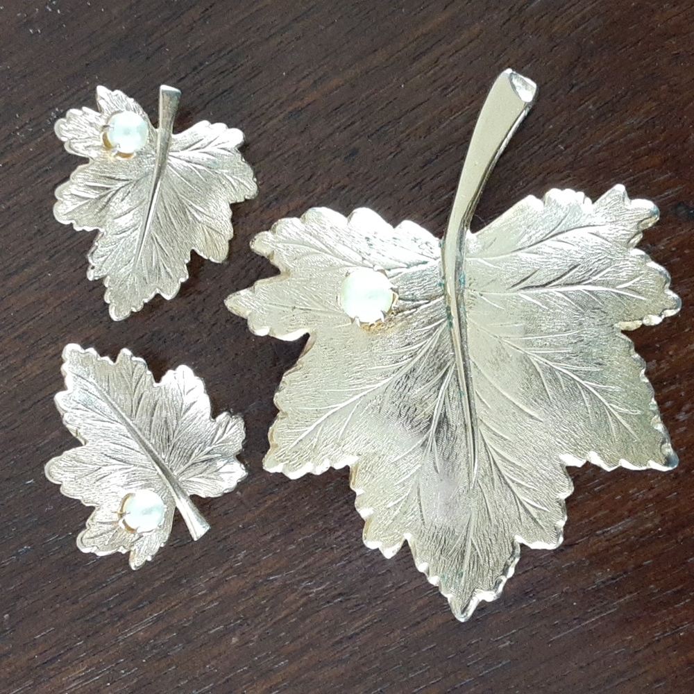 Earrings and brooch set by Sarah Coventry